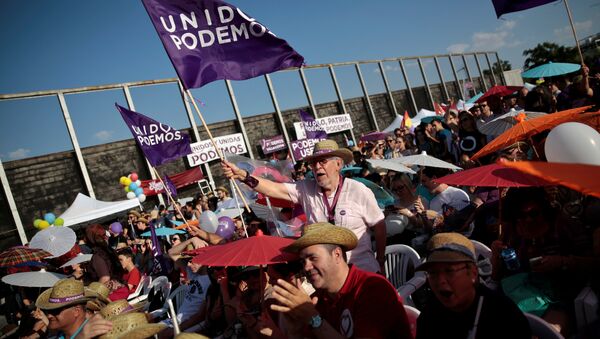 Supporters of the coalition Unidos Podemos (Together We Can) attend the last campaign rally for Spain's upcoming general election in Madrid, Spain, June 24, 2016 - Sputnik International