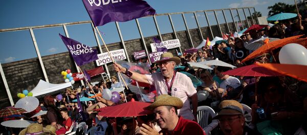 Supporters of the coalition Unidos Podemos (Together We Can) attend the last campaign rally for Spain's upcoming general election in Madrid, Spain, June 24, 2016 - Sputnik International