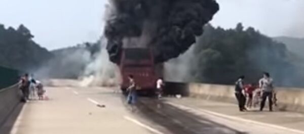 Dozens die as bus catches fire in C China Dozens die as bus catches fire in C China - Sputnik International