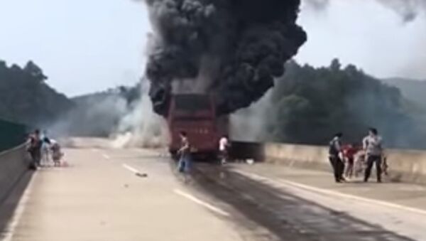 Dozens die as bus catches fire in C China - Sputnik International