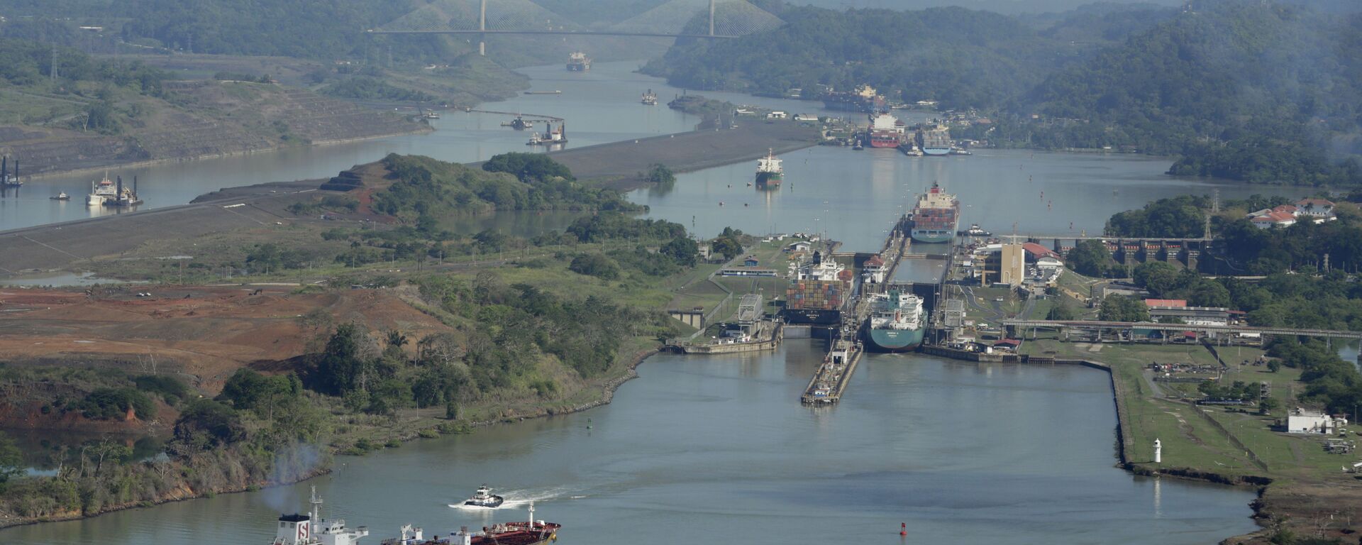 In this May 11, 2016 file photo, ships transit through the Panama Canal near Panama City - Sputnik International, 1920, 23.12.2024