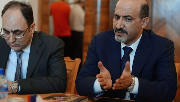 Ahmad al-Jarba, right, President of the National Coalition of Syrian Revolutionary and Opposition Forces, during a meeting between a Syrian opposition delegation and Russian Foreign Minister Sergei Lavrov in Moscow - Sputnik International