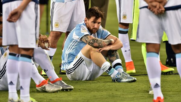 Argentina's Lionel Messi waits to receive the second place medal during the Copa America Centenario awards ceremony in East Rutherford, New Jersey, United States, on June 26, 2016 - Sputnik International