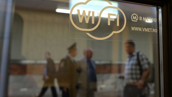 A sticker on a metro train window announces the availability of Wi-Fi connection at the newly-opened Kotelniki station of the Moscow Metro - Sputnik International