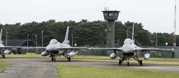 A picture taken on June 27, 2016 shows the departure of six planes of the Belgian army, F-16 fighter jets at themilitary airbase in Kleine Brogel, Peer to participate in the Operation Guardian Falcon (ODF) as part of the international mission against Islamic State (IS) in Middle East A picture taken on June 27, 2016 shows the departure of six planes of the Belgian army, F-16 fighter jets at themilitary airbase in Kleine Brogel, Peer to participate in the Operation Guardian Falcon (ODF) as part of the international mission against Islamic State (IS) in Middle East - Sputnik International