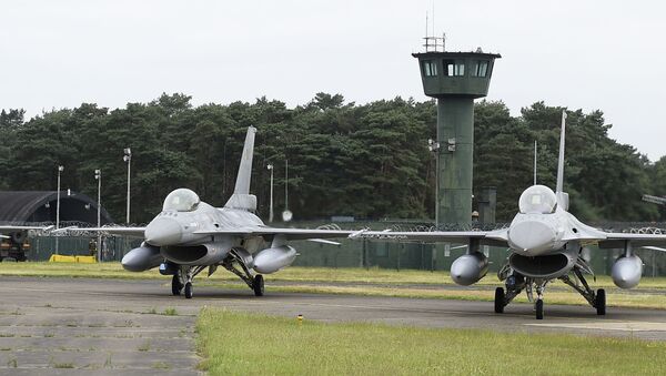 A picture taken on June 27, 2016 shows the departure of six planes of the Belgian army, F-16 fighter jets at themilitary airbase in Kleine Brogel, Peer to participate in the Operation Guardian Falcon (ODF) as part of the international mission against Islamic State (IS) in Middle East - Sputnik International