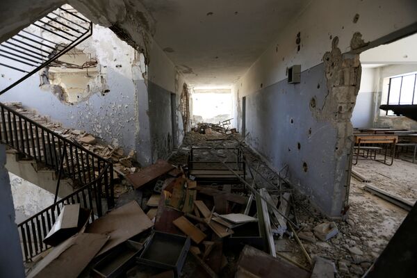 Damage is seen inside 'Syria, The Hope' school on the outskirts of the rebel-controlled area of Maaret al-Numan town, in Idlib province, Syria June 1, 2016 Damage is seen inside 'Syria, The Hope' school on the outskirts of the rebel-controlled area of Maaret al-Numan town, in Idlib province, Syria June 1, 2016 - Sputnik International