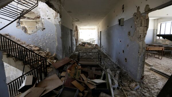 Damage is seen inside 'Syria, The Hope' school on the outskirts of the rebel-controlled area of Maaret al-Numan town, in Idlib province, Syria June 1, 2016 - Sputnik International