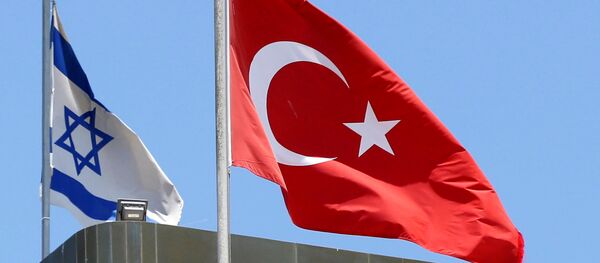 A Turkish flag flutters atop the Turkish embassy as an Israeli flag is seen nearby, in Tel Aviv, Israel, June 26, 2016 A Turkish flag flutters atop the Turkish embassy as an Israeli flag is seen nearby, in Tel Aviv, Israel, June 26, 2016 - Sputnik International