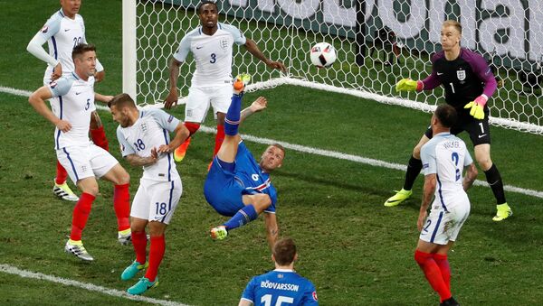 Football Soccer - England v Iceland - EURO 2016 - Round of 16 - Stade de Nice, Nice, France - 27/6/16Iceland's Ragnar Sigurdsson attempts an overhead kick - Sputnik International