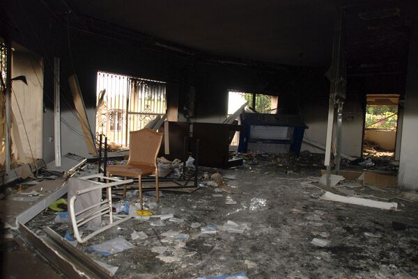 In this Sept. 12, 2012 file photo, glass, debris and overturned furniture are strewn inside a room in the gutted U.S. consulate in Benghazi, Libya, after an attack that killed four Americans, including Ambassador Chris Stevens In this Sept. 12, 2012 file photo, glass, debris and overturned furniture are strewn inside a room in the gutted U.S. consulate in Benghazi, Libya, after an attack that killed four Americans, including Ambassador Chris Stevens - Sputnik International
