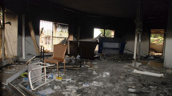 In this Sept. 12, 2012 file photo, glass, debris and overturned furniture are strewn inside a room in the gutted U.S. consulate in Benghazi, Libya, after an attack that killed four Americans, including Ambassador Chris Stevens - Sputnik International