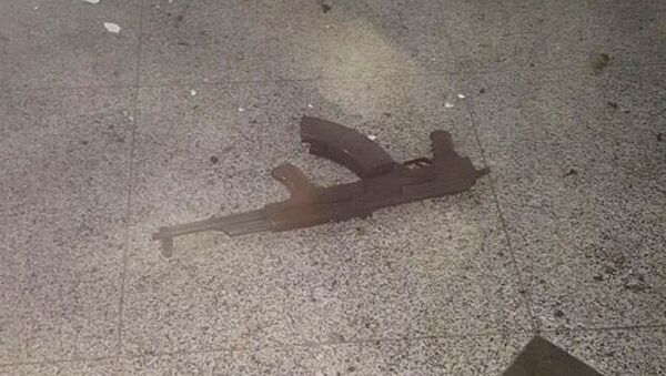A weapon is seen on the floor at Ataturk airport after suicide bombers opened fire before blowing themselves up at the entrance, in Istanbul, Turkey June 28, 2016. - Sputnik International