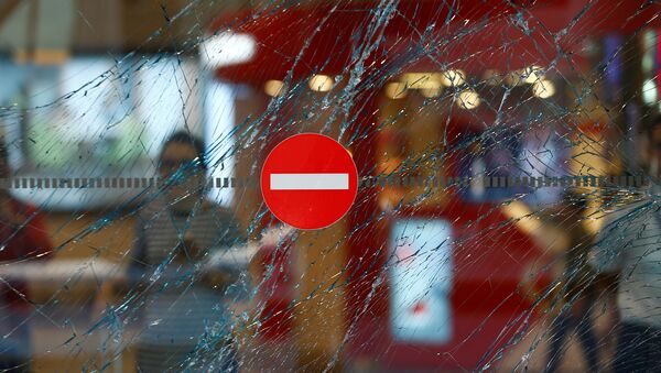 A broken window is seen at Turkey's largest airport, Istanbul Ataturk, Turkey, following yesterday's blasts June 29, 2016. - Sputnik International
