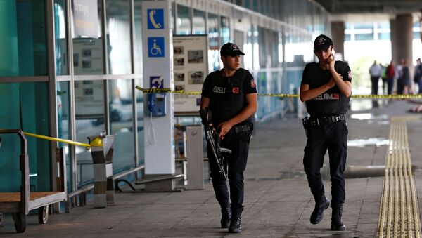Police officers patrol at Turkey's largest airport, Istanbul Ataturk, following yesterday's blast June 29, 2016. - Sputnik International