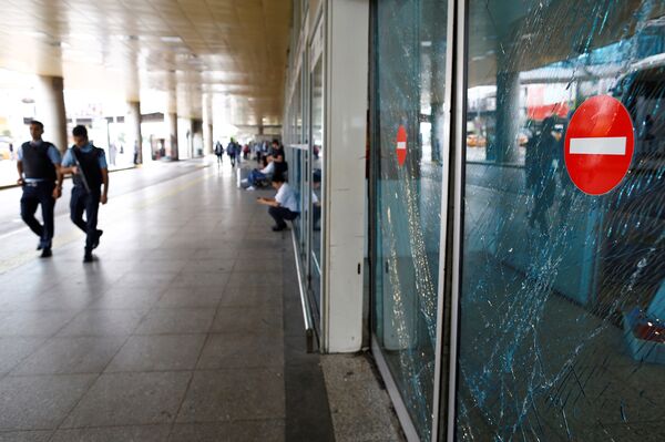 Police officers patrol at Turkey's largest airport, Istanbul Ataturk, following yesterday's blast, June 29, 2016. Police officers patrol at Turkey's largest airport, Istanbul Ataturk, following yesterday's blast, June 29, 2016. - Sputnik International
