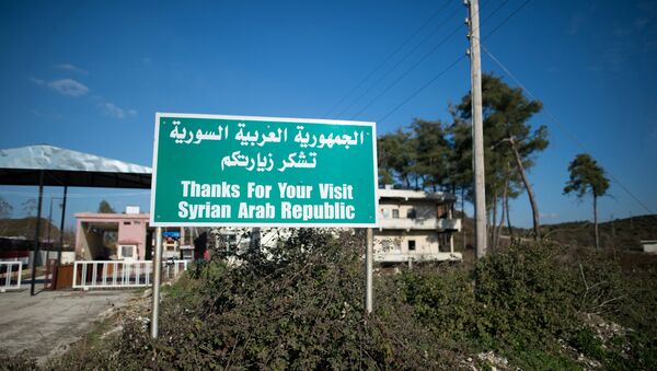 A sign by a closed checkpoint at the Syrian-Turkish border near the town of Kessab - Sputnik International