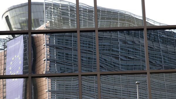 European Union headquarters is reflected in the windows of the EU Council building prior to an EU summit in Brussels on Tuesday, June 28, 2016. - Sputnik International