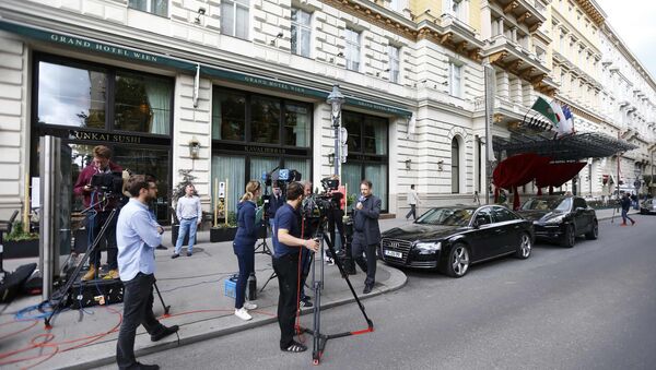 Members of the media gather outside a hotel where the International Association of Athletics Federations (IAAF) council holds a meeting in Vienna, Austria, June 17, 2016. - Sputnik International