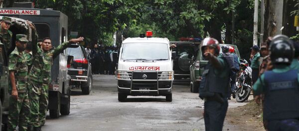 An ambulance transports bodies found at a restaurant popular with foreigners after heavily armed militants attacked it on Friday night in Dhaka, Bangladesh, Saturday, July 2, 2016 - Sputnik International