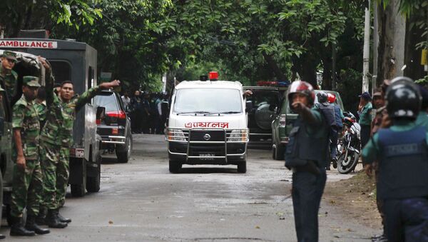 An ambulance transports bodies found at a restaurant popular with foreigners after heavily armed militants attacked it on Friday night in Dhaka, Bangladesh, Saturday, July 2, 2016 - Sputnik International