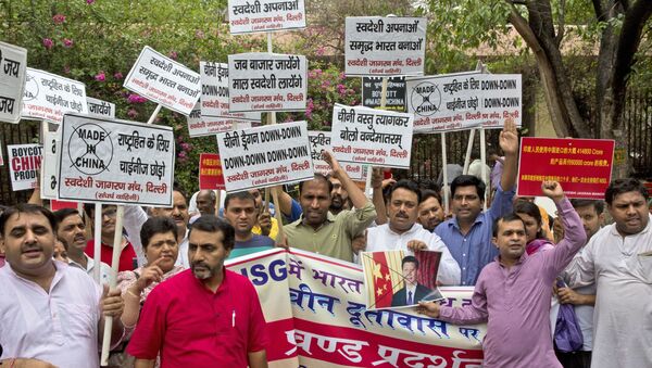 Activists of Swadeshi Jagaran Manch, a Hindu right wing organization promoting indigenous products, shout slogans during a protest near the Chinese embassy in New Delhi, India, Tuesday, June 28, 2016 - Sputnik International