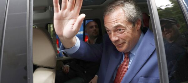 Nigel Farage, the former leader of the United Kingdom Independence Party (UKIP) waves as he leaves following the EU referendum vote, in central London, Britain June 24, 2016. - Sputnik International