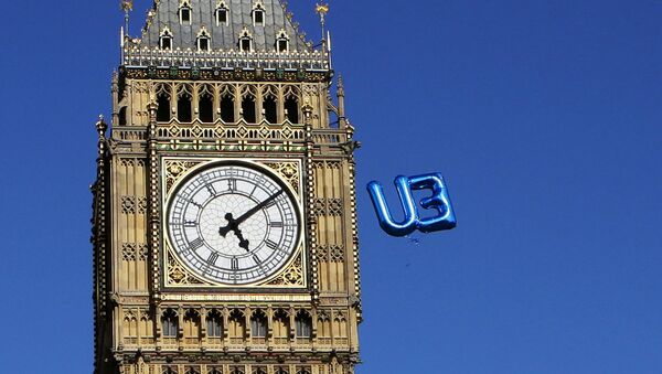 A balloon floats towards the Big Ben clock tower in Parliament Square during a 'March for Europe' demonstration against Britain's decision to leave the European Union, in central London, Britain, July 2, 2016. - Sputnik International