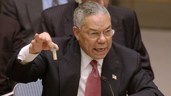 The image seen round the world of Secretary of State Colin Powell and his mock vial of anthrax,which he held up during a presentation before the UN on Iraq's alleged weapons of mass destruction program, February 5, 2003. - Sputnik International