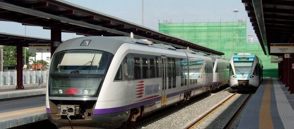 Proastiakos suburban trains at Piraeus railway station Proastiakos suburban trains at Piraeus railway station - Sputnik International