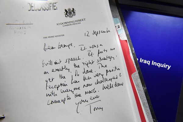 Detail of a declassified handwritten letter sent by the then British PM Tony Blair, to George Bush, is seen as part of the Iraq Inquiry Report, in London. - Sputnik International