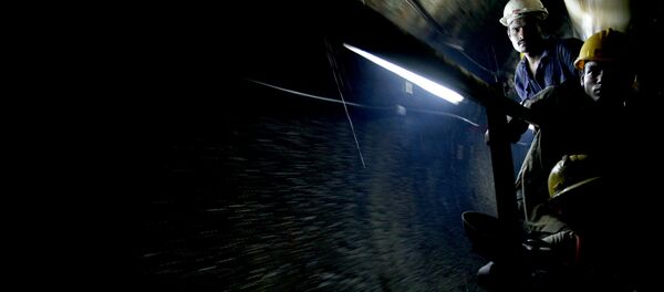 Indian construction workers squeeze onto a trolley as they travel through an underground work site at Adarsh Nagar in the Andheri suburb of Mumbai (File) Indian construction workers squeeze onto a trolley as they travel through an underground work site at Adarsh Nagar in the Andheri suburb of Mumbai (File) - Sputnik International