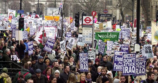Demonstrators at the rally in London, 15 February 2003, as worldwide protests brought tens of thousands into the streets to show their opposition to a possible US-led war against Iraq. Demonstrators at the rally in London, 15 February 2003, as worldwide protests brought tens of thousands into the streets to show their opposition to a possible US-led war against Iraq. - Sputnik International