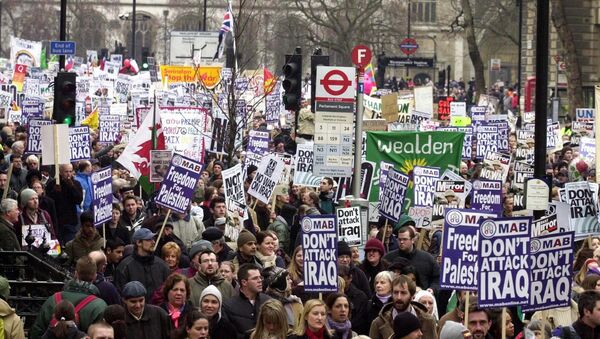 Demonstrators at the rally in London, 15 February 2003, as worldwide protests brought tens of thousands into the streets to show their opposition to a possible US-led war against Iraq. - Sputnik International