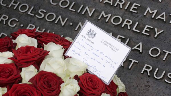 Flowers from British Prime Minister David Cameron are displayed at the memorial to the victims of the July 7, 2005 London bombings, in Hyde Park, London. - Sputnik International
