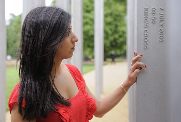 Saba Mozakka, whose mother Behnaz Mozakka was killed in the London terrorist attacks on July 7, 2005, places her hand on a memorial dedicated to the London Bombing victims, in Hyde Park, central London, on July 6, 2009. Saba Mozakka, whose mother Behnaz Mozakka was killed in the London terrorist attacks on July 7, 2005, places her hand on a memorial dedicated to the London Bombing victims, in Hyde Park, central London, on July 6, 2009. - Sputnik International