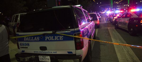 Police cars sit on Main Street in Dallas following the sniper shooting during a protest on July 7, 2016. - Sputnik International