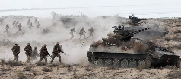 Kazakh riflemen charging an attack at the large-scale strategic exercises on the Oimasha range, Kazakhstan Kazakh riflemen charging an attack at the large-scale strategic exercises on the Oimasha range, Kazakhstan - Sputnik International