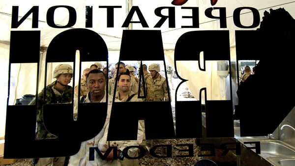 US soldiers from the 4th Infantry Division stand in a queue for their Christmas lunch out side a glass door where a logo of US army reading Operation Iraqi Freedom is pasted at a US base in Tikrit, 180 Kilometers (110 miles) north of Iraqi capital Baghdad, 25 December 2003 - Sputnik International