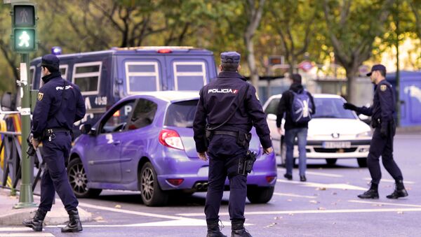 Policemen stop a car to check it in front of Santiago Bernabeu stadium before the Spanish league Clasico football match Real Madrid CF vs FC Barcelona at the Santiago Bernabeu stadium in Madrid - Sputnik International