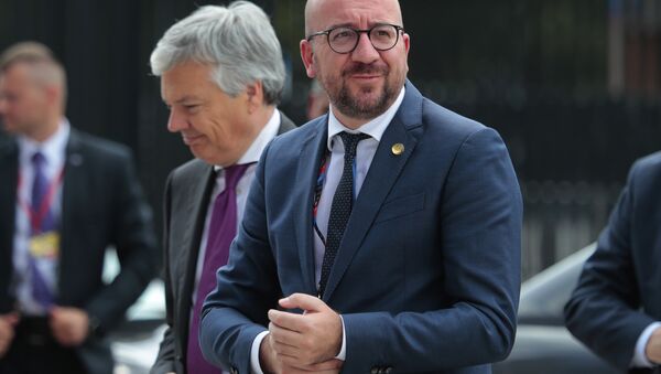 Belgian Prime Minister Charles Michel, right, arrives at the NATO summit in Warsaw, Poland, Friday, July 8, 2016. - Sputnik International