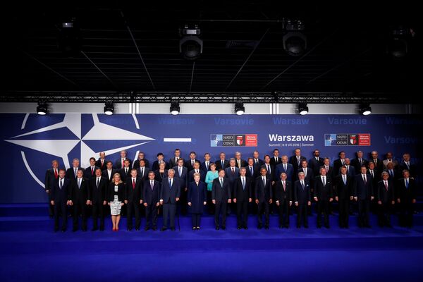 NATO heads of state and other leaders participate in a family photo at the NATO Summit in Warsaw, Poland July 8, 2016. NATO heads of state and other leaders participate in a family photo at the NATO Summit in Warsaw, Poland July 8, 2016. - Sputnik International