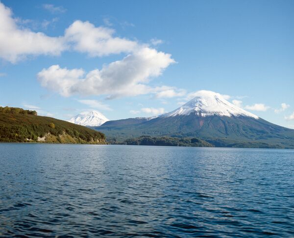 View of Ilyinsky volcano on the shore of Kurile Lake. View of Ilyinsky volcano on the shore of Kurile Lake. - Sputnik International