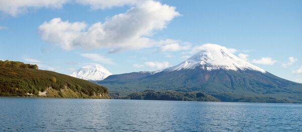 View of Ilyinsky volcano on the shore of Kurile Lake. View of Ilyinsky volcano on the shore of Kurile Lake. - Sputnik International