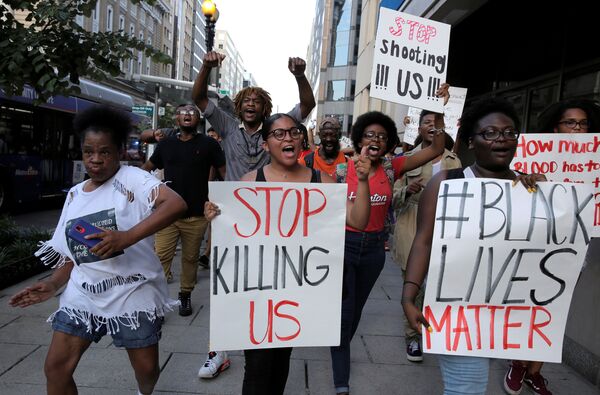 Demonstrators with Black Lives Matter march during a protest in Washington, U.S., July 8, 2016. - Sputnik International