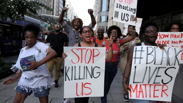 Demonstrators with Black Lives Matter march during a protest in Washington, U.S., July 8, 2016. - Sputnik International
