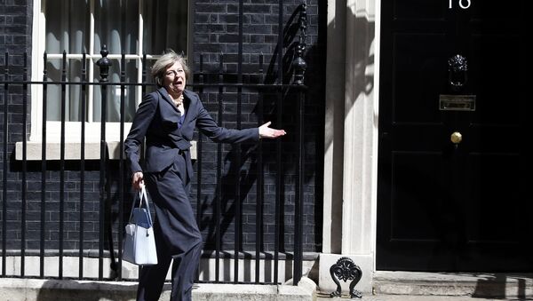 Britain's Home Secretary Theresa May, who is due to take over as prime minister on Wednesday, leaves after a cabinet meeting at number 10 Downing Street, in central London, Britain July 12, 2016. - Sputnik International