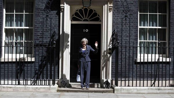 Britain's Home Secretary Theresa May, who is due to take over as prime minister on Wednesday, waves as she leaves after a cabinet meeting at number 10 Downing Street, in central London, Britain July 12, 2016 - Sputnik International