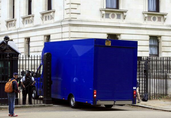 A furniture removal lorry is seen parked at the rear of number 10 Downing Street, in central London, Britain July 12, 2016 A furniture removal lorry is seen parked at the rear of number 10 Downing Street, in central London, Britain July 12, 2016 - Sputnik International