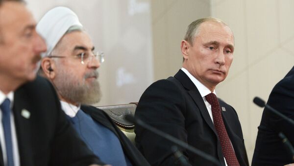 From left: President of Azerbaijan Ilham Aliyev, Iranian President Hassan Rouhani and Russian President Vladimir Putin (File) - Sputnik International